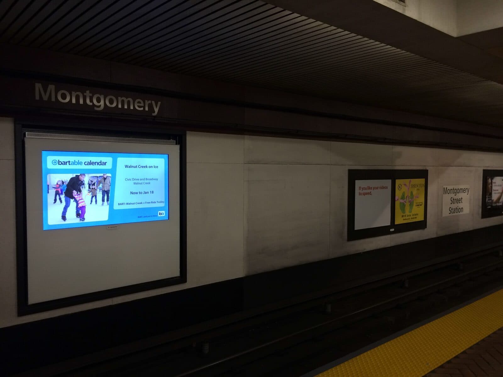 A Montgomery Street station screen featuring a BARTable promotion for Walnut Creek on Ice.